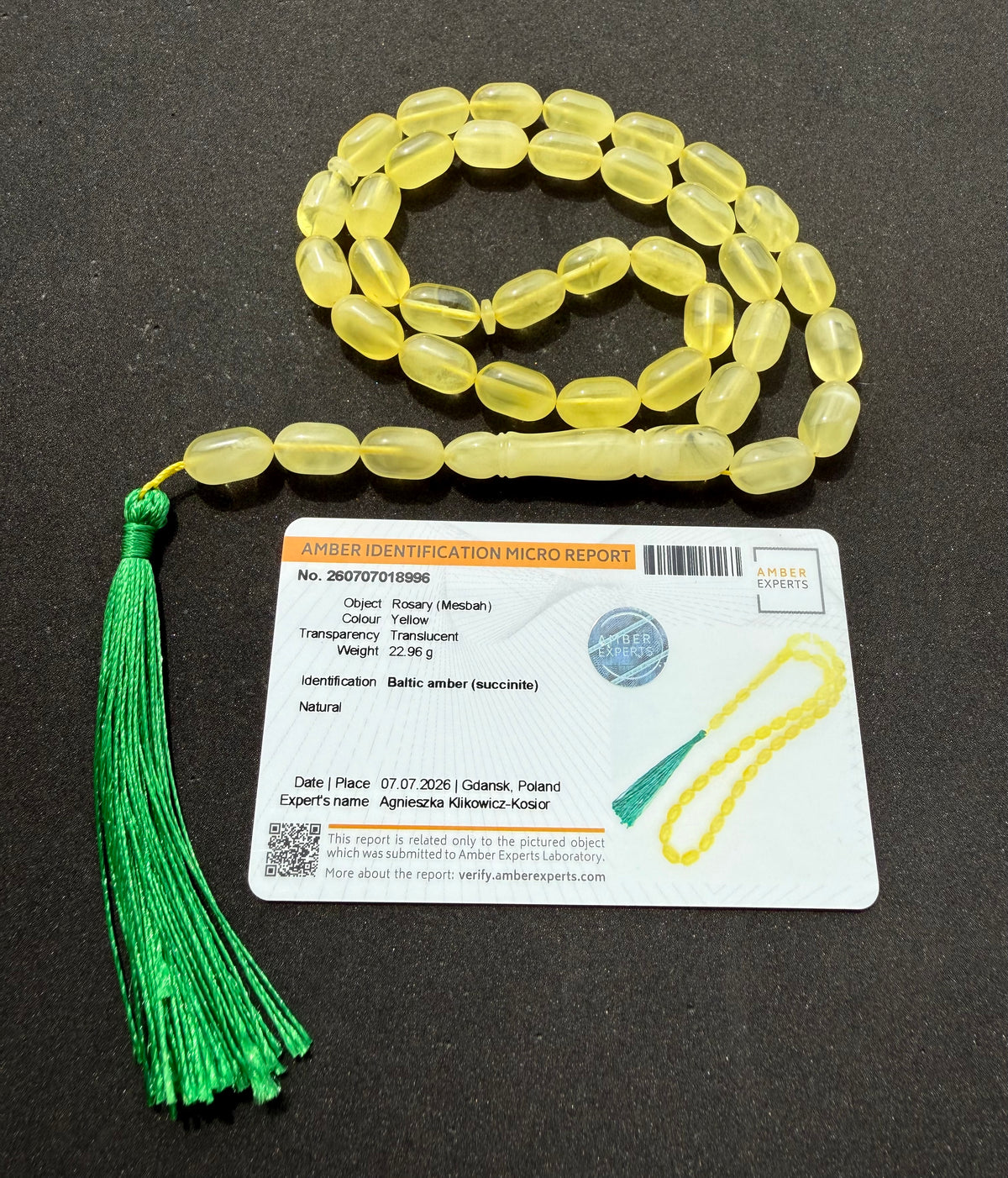 Natural Baltic amber Tesbih with 36 translucent lemon yellow olive-shaped beads.