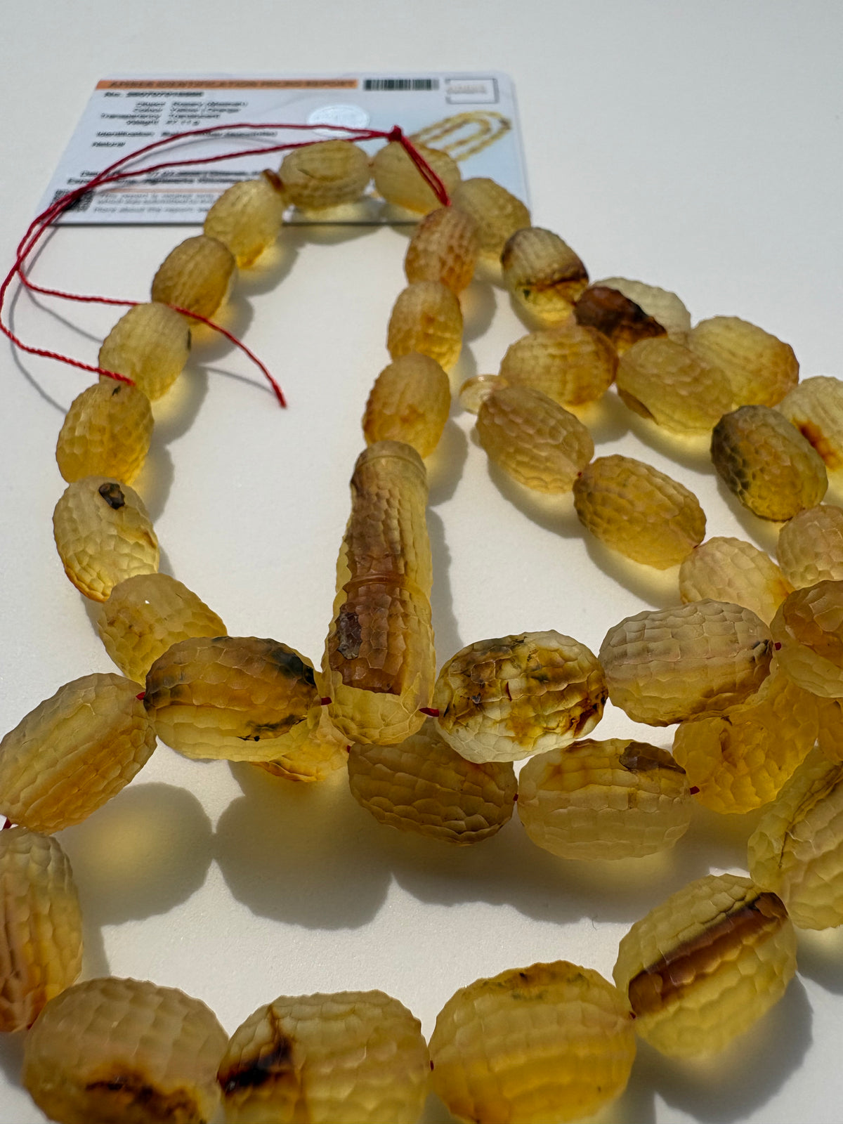 Luxury Baltic amber prayer beads in golden honey color.