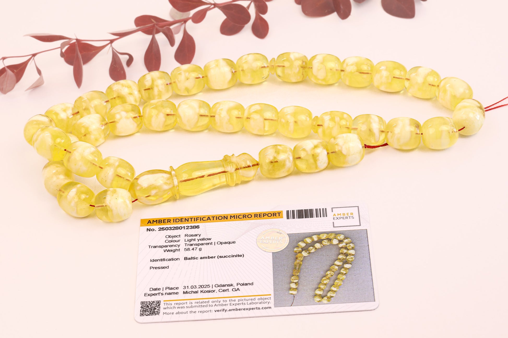 Tetibel Jewels Certified Amber Tesbih product image, showing the total 58.47 gram weight and official micro report certificate.