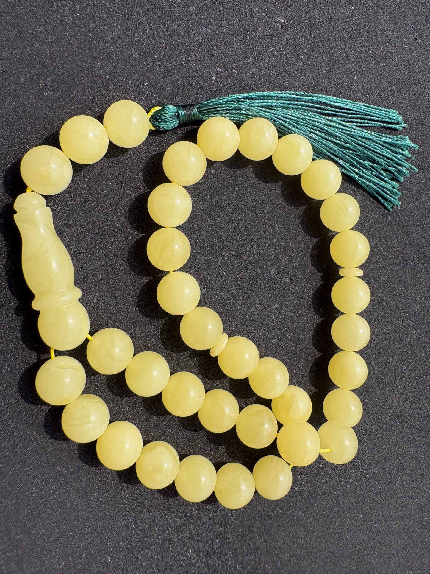 Tetibel Baltic amber prayer beads crafted from natural yellow amber.