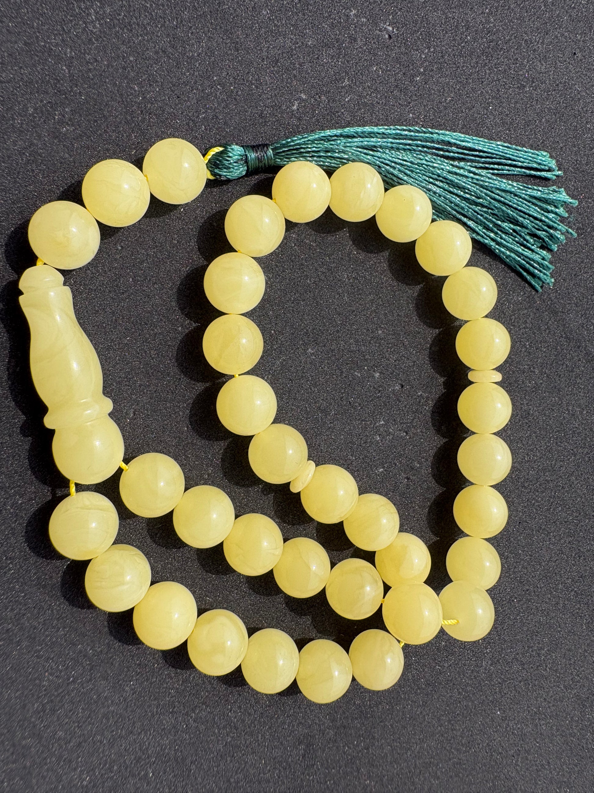 Tetibel Baltic amber prayer beads crafted from natural yellow amber.
