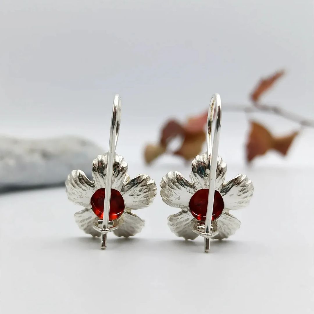 Bernstein-Silber-Ohrringe mit floralem Design in hellem Silber