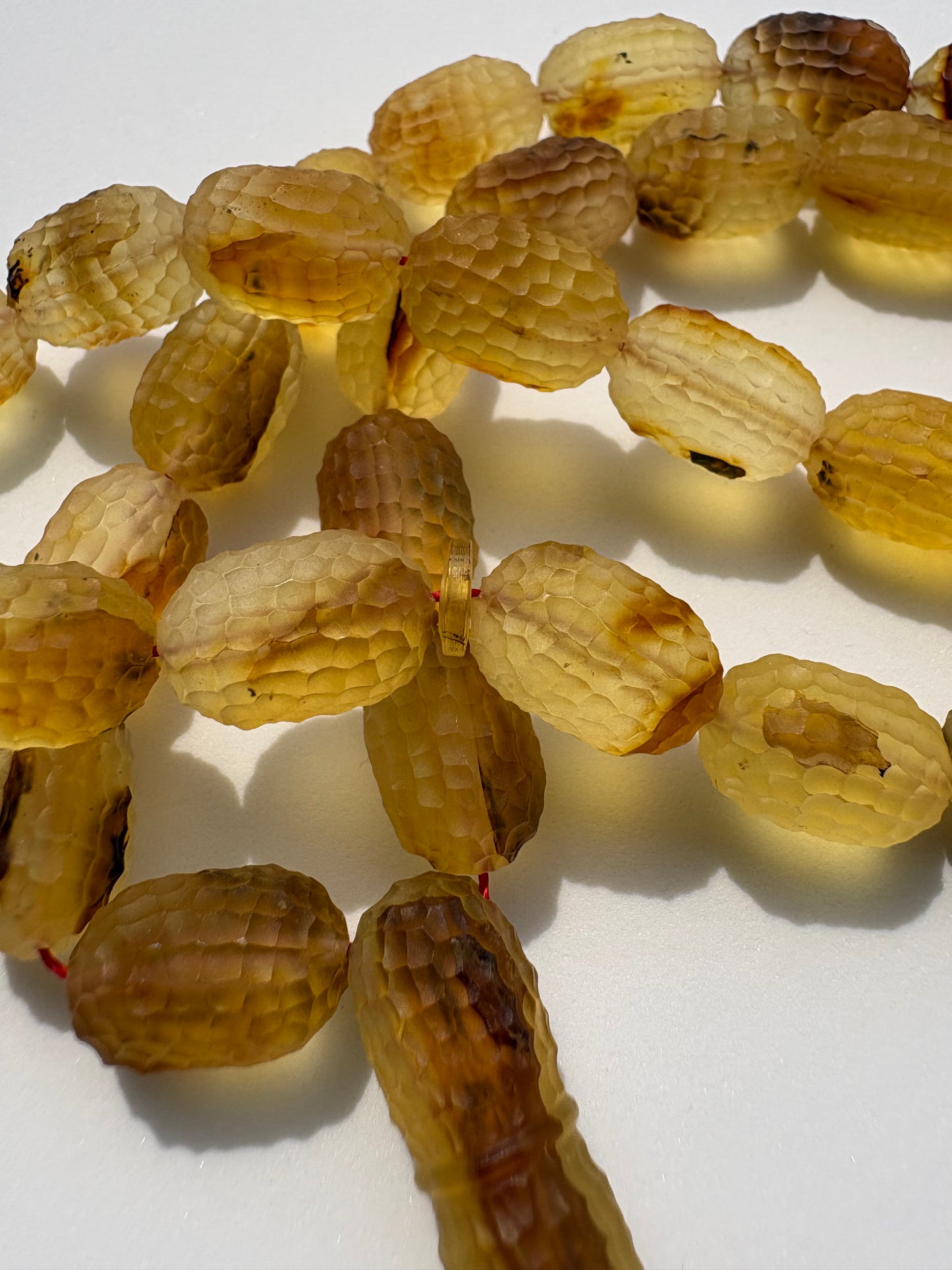Genuine succinite amber Tesbih with 41 translucent carved beads.