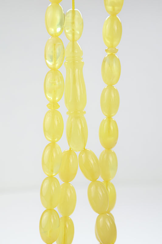 Certified natural translucent yellow Baltic amber misbaha rosary with 42 beads measuring 14.5x9 mm by Tetibel.