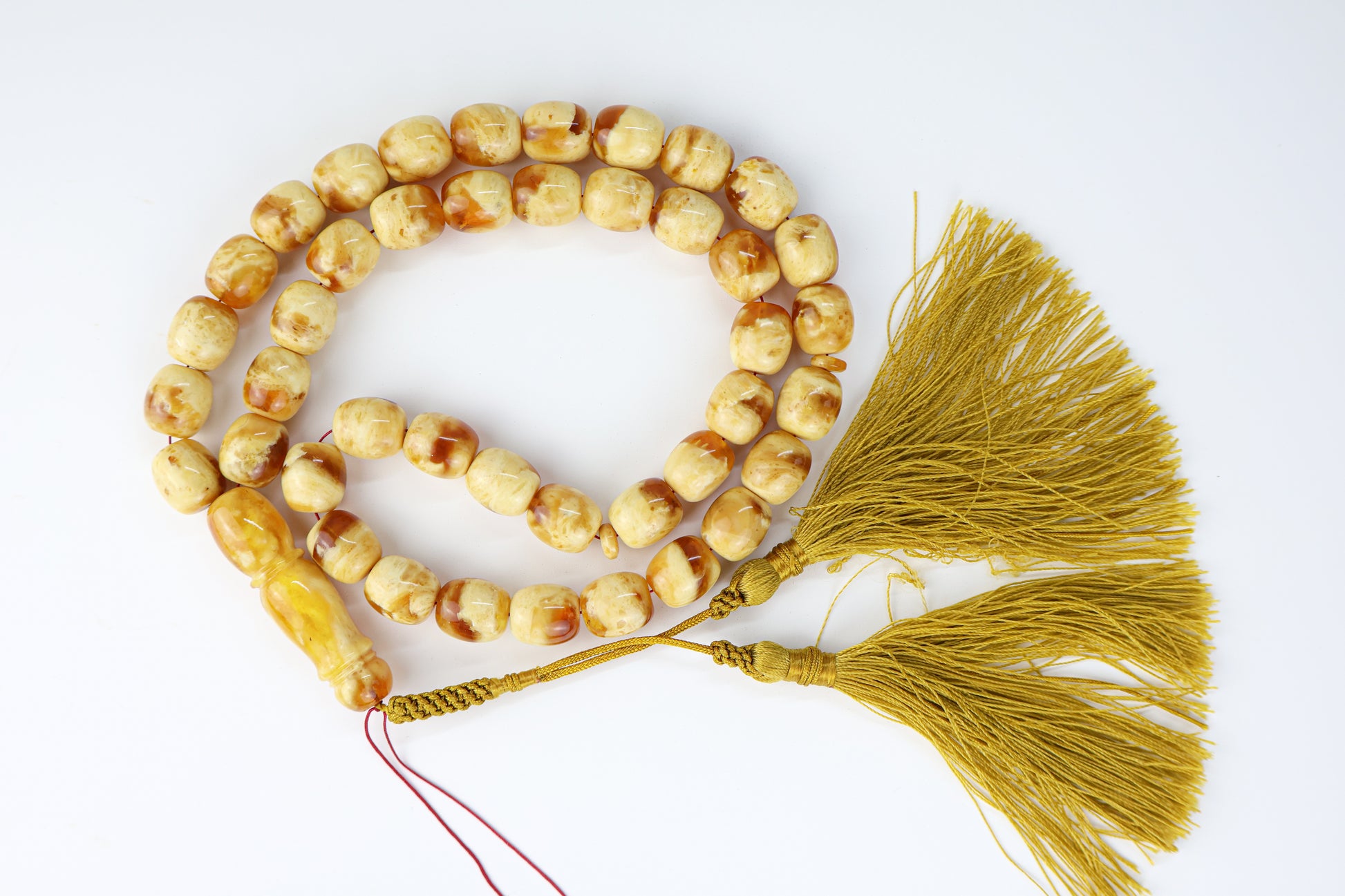 Pressed Baltic amber prayer beads 42 beads 14.5x12mm 64.53g with handmade golden yellow Doha Qatar tassel and lab certificate from Tetibel Amber Jewels