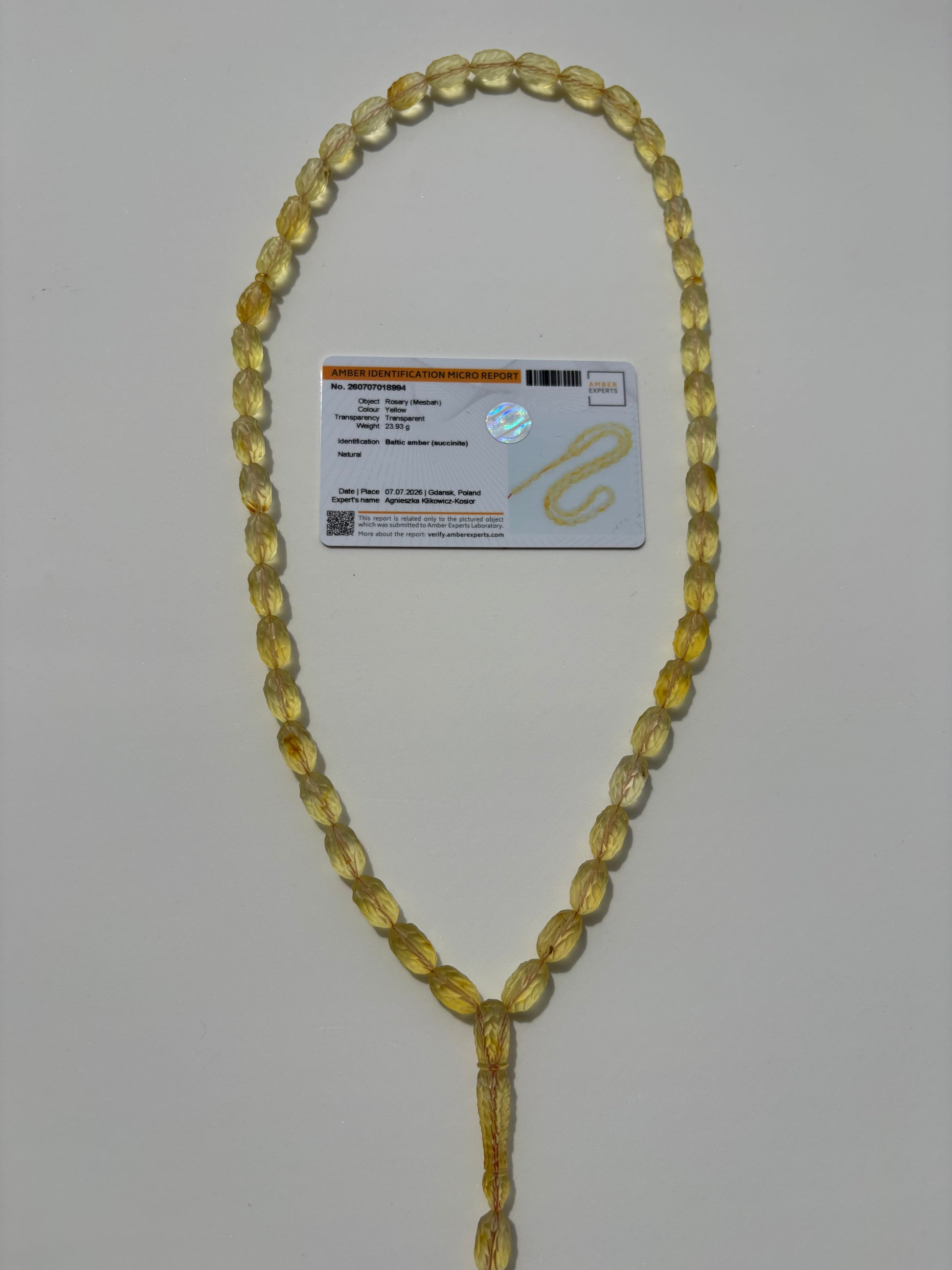 Collector-grade carved lemon amber rosary with certificate.