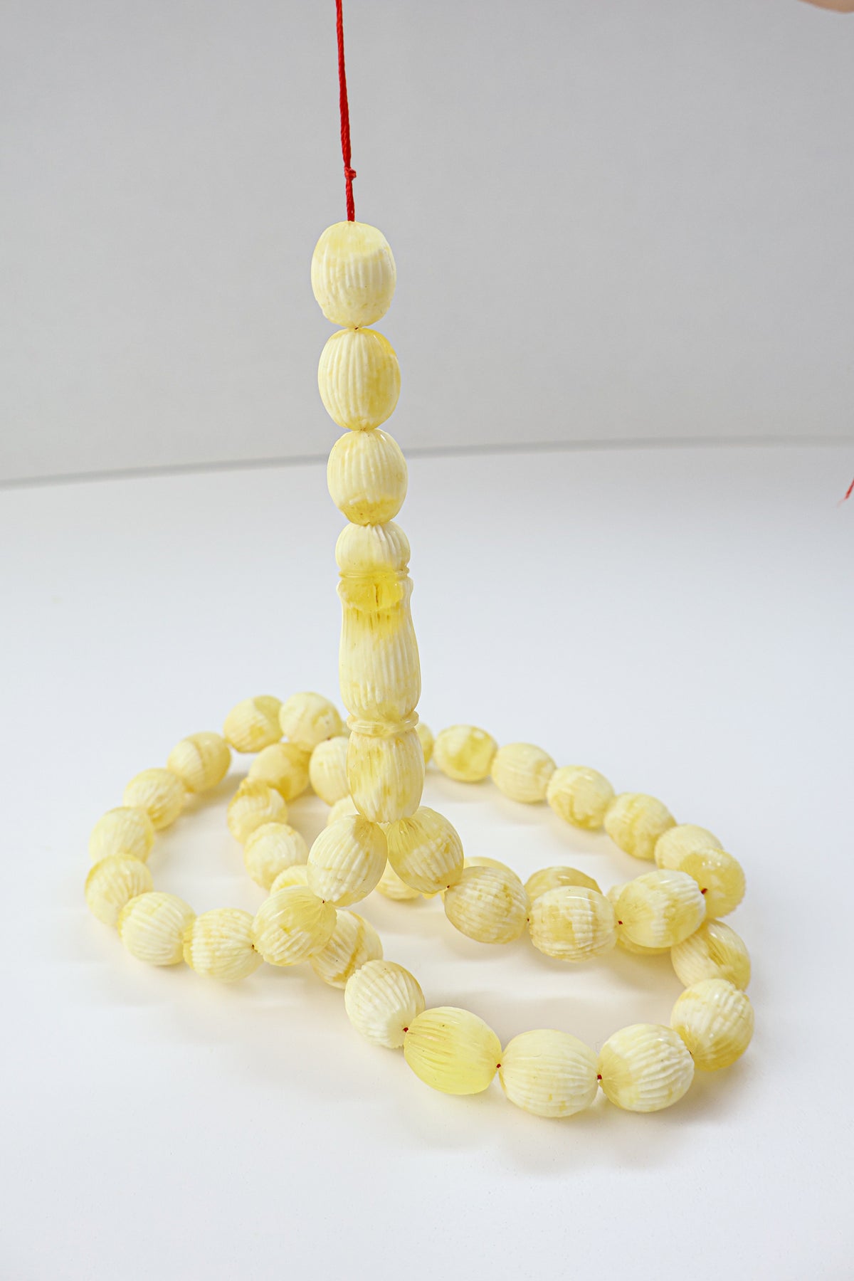 56.48g Baltic amber prayer beads (misbaha) with hand-carved ridges certified by Amber Experts Laboratory in Gdansk, Poland.