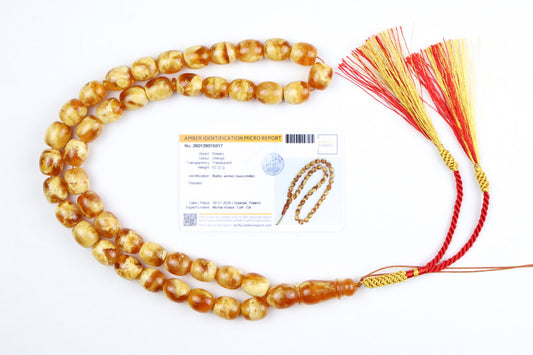 Certified Baltic amber misbaha 62.22g made of natural succinite with red and gold tassel