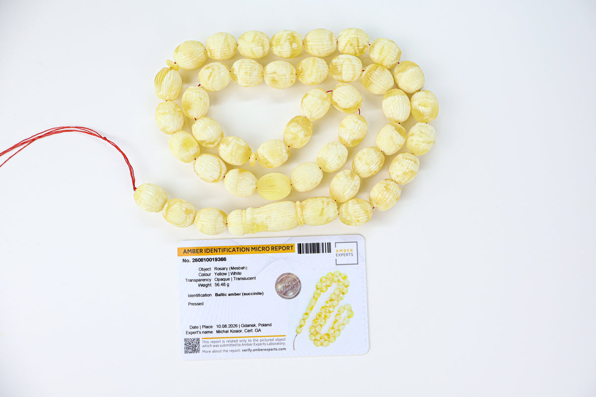Laboratory certified Baltic amber rosary display with official micro report card No. 260810019366 from Tetibel Amber Jewels.