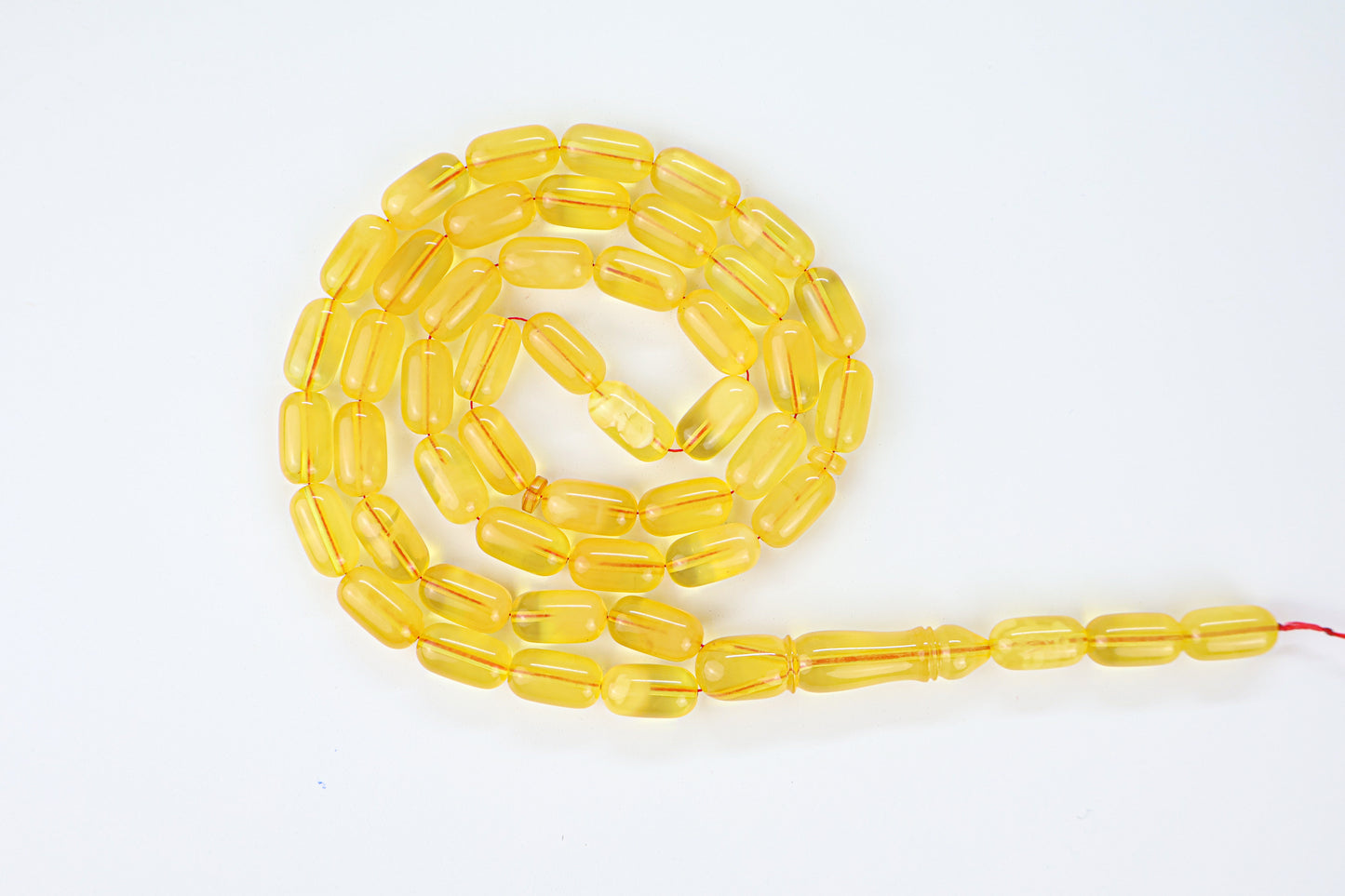Authentic transparent dark yellow Baltic amber misbaha strand with matching amber imam head and 48 beads.