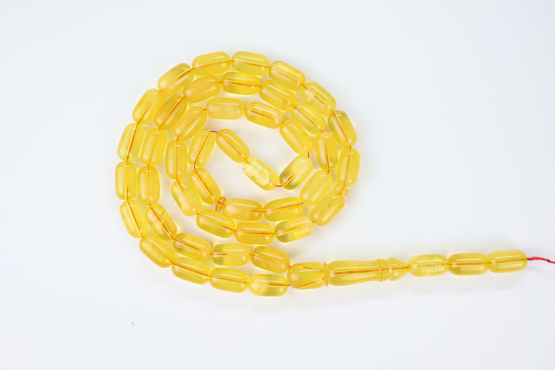 Authentic transparent dark yellow Baltic amber misbaha strand with matching amber imam head and 48 beads.