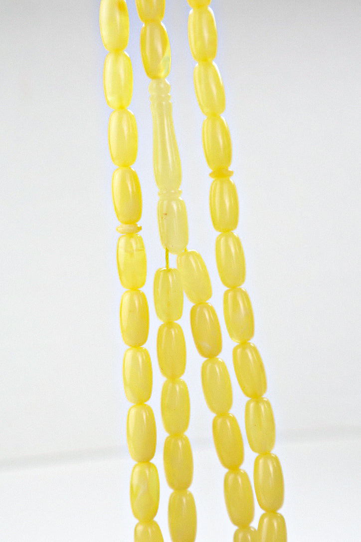 Handcrafted yellow succinite amber tasbih featuring 48 authentic 12.4x6.3mm barrel beads, weight 20.40 grams.