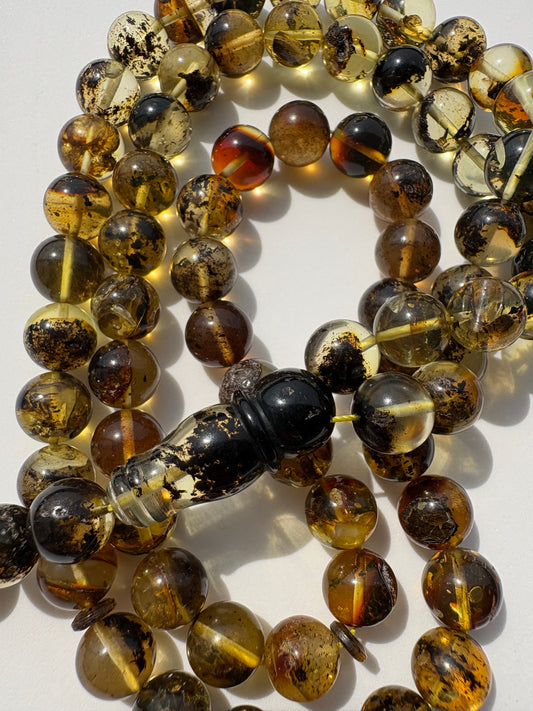 Tetibel Natural Baltic amber Tesbih with 72 translucent multicolor round amber beads.