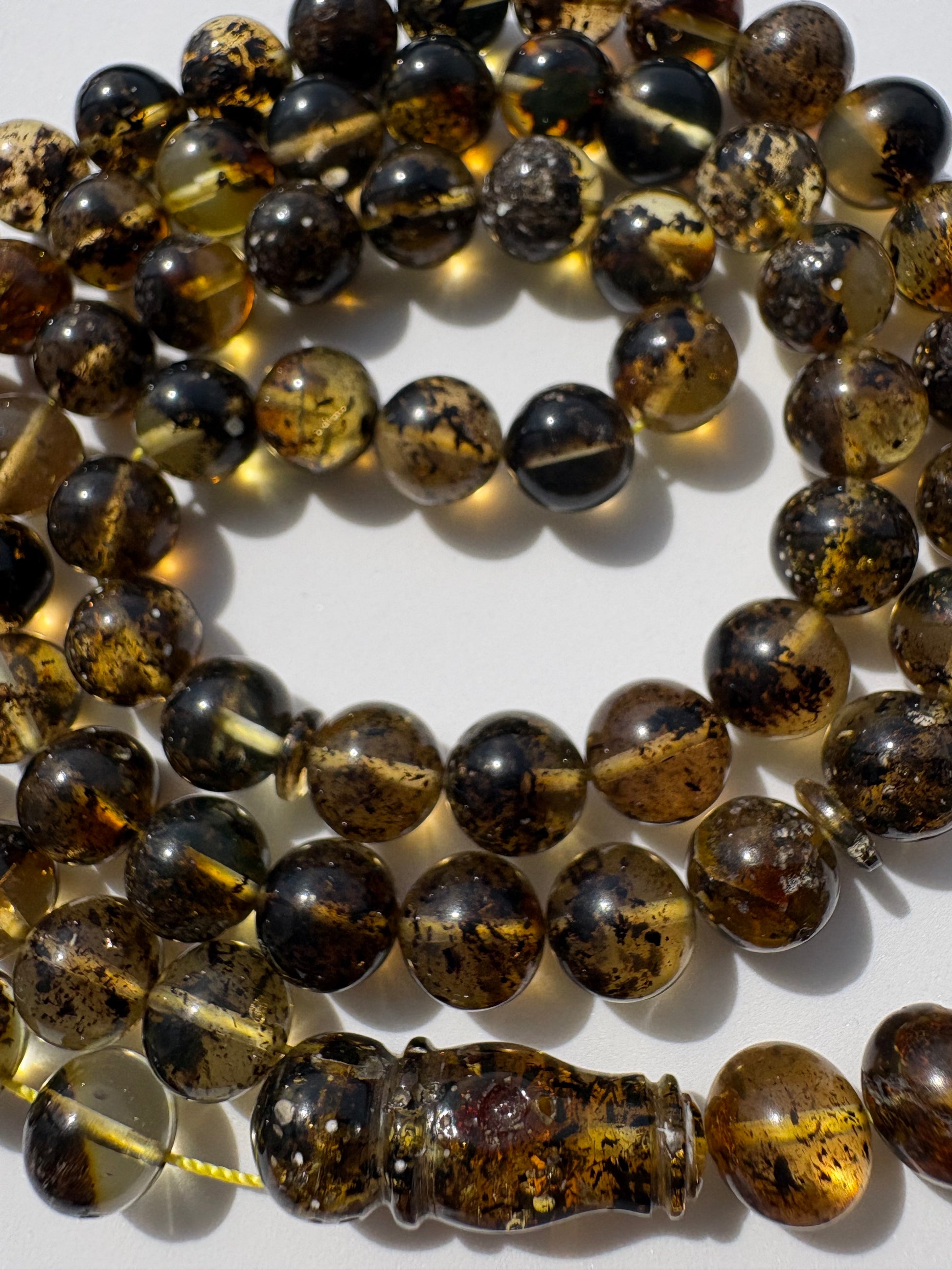 Luxury Baltic amber Tesbih with polished 10 mm spherical beads.