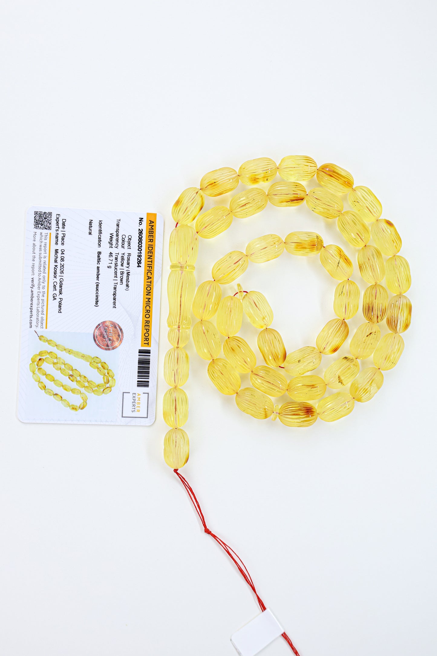 Certified natural hand-carved translucent yellow and brown Baltic amber misbaha rosary with 42 beads measuring 16.3x10.2 mm by Tetibel.