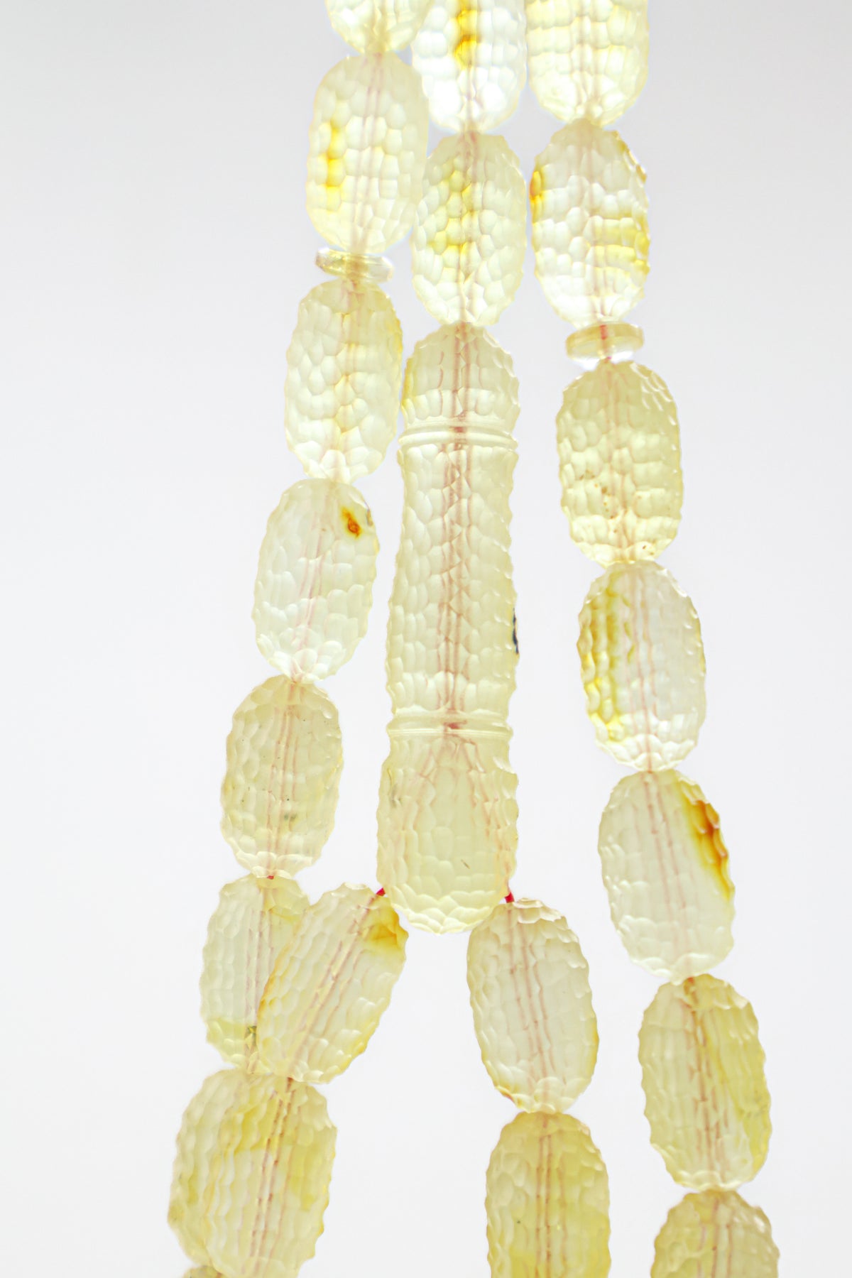 Certified natural hand-carved translucent yellow Baltic amber misbaha rosary with 36 beads measuring 15x8.5 mm by Tetibel.