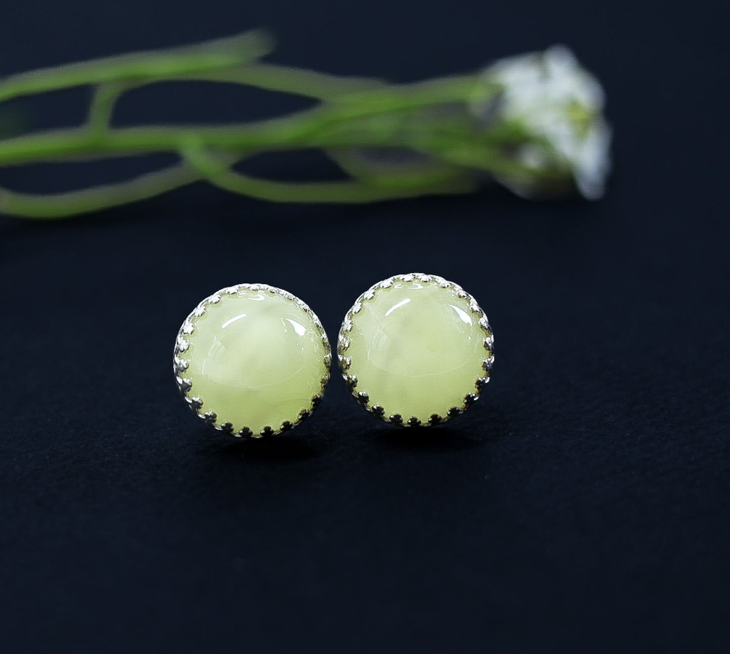 Tetibel Jewels' large 12mm Lemon (Milky Green) Baltic amber stud earrings, set in genuine 925 sterling silver with a crown-like bezel