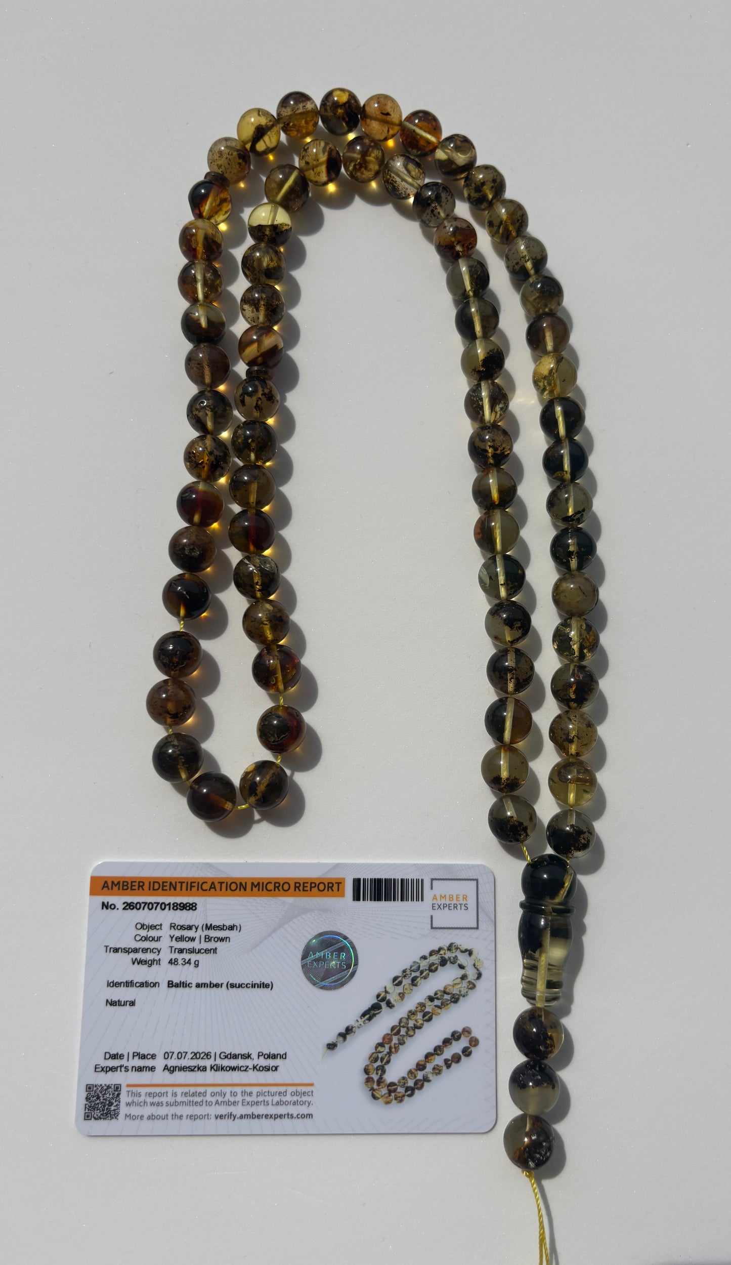 Certified Baltic amber Misbaha featuring cognac and honey amber beads.