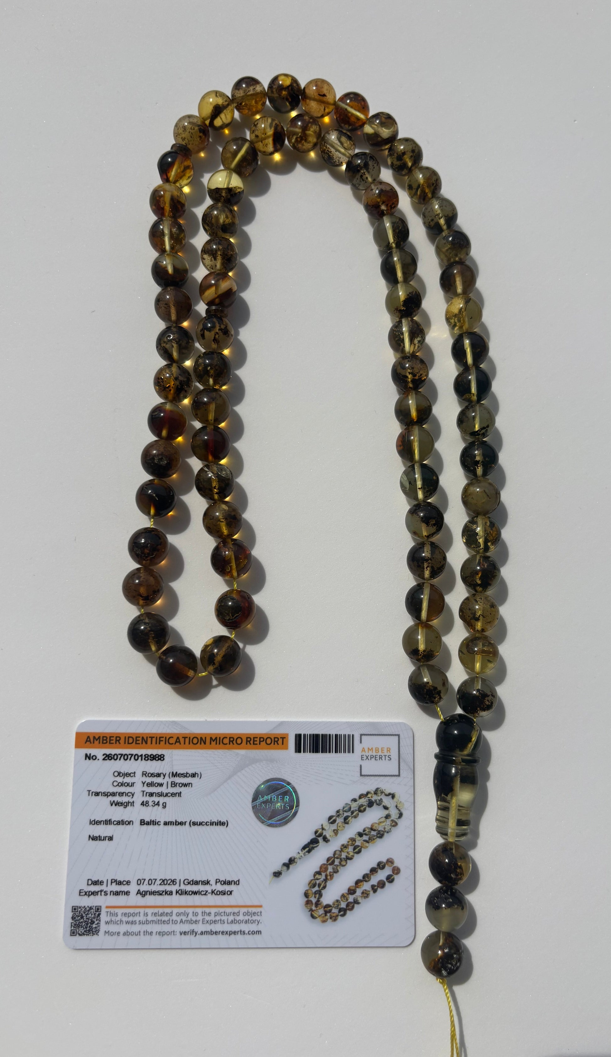 Certified Baltic amber Misbaha featuring cognac and honey amber beads.