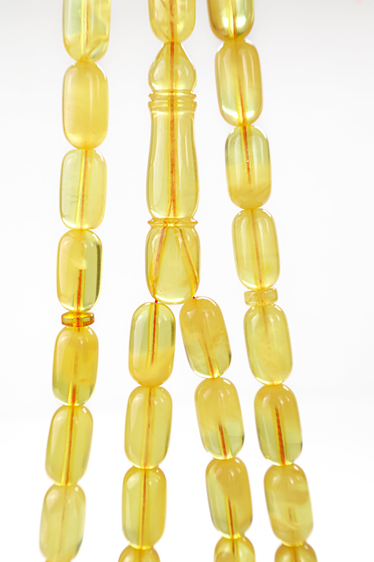 Certified natural transparent dark yellow Baltic amber misbaha rosary with 48 beads measuring 14.5x8 mm by Tetibel.