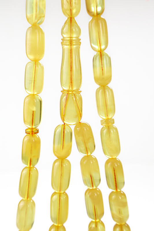 Certified natural transparent dark yellow Baltic amber misbaha rosary with 48 beads measuring 14.5x8 mm by Tetibel.