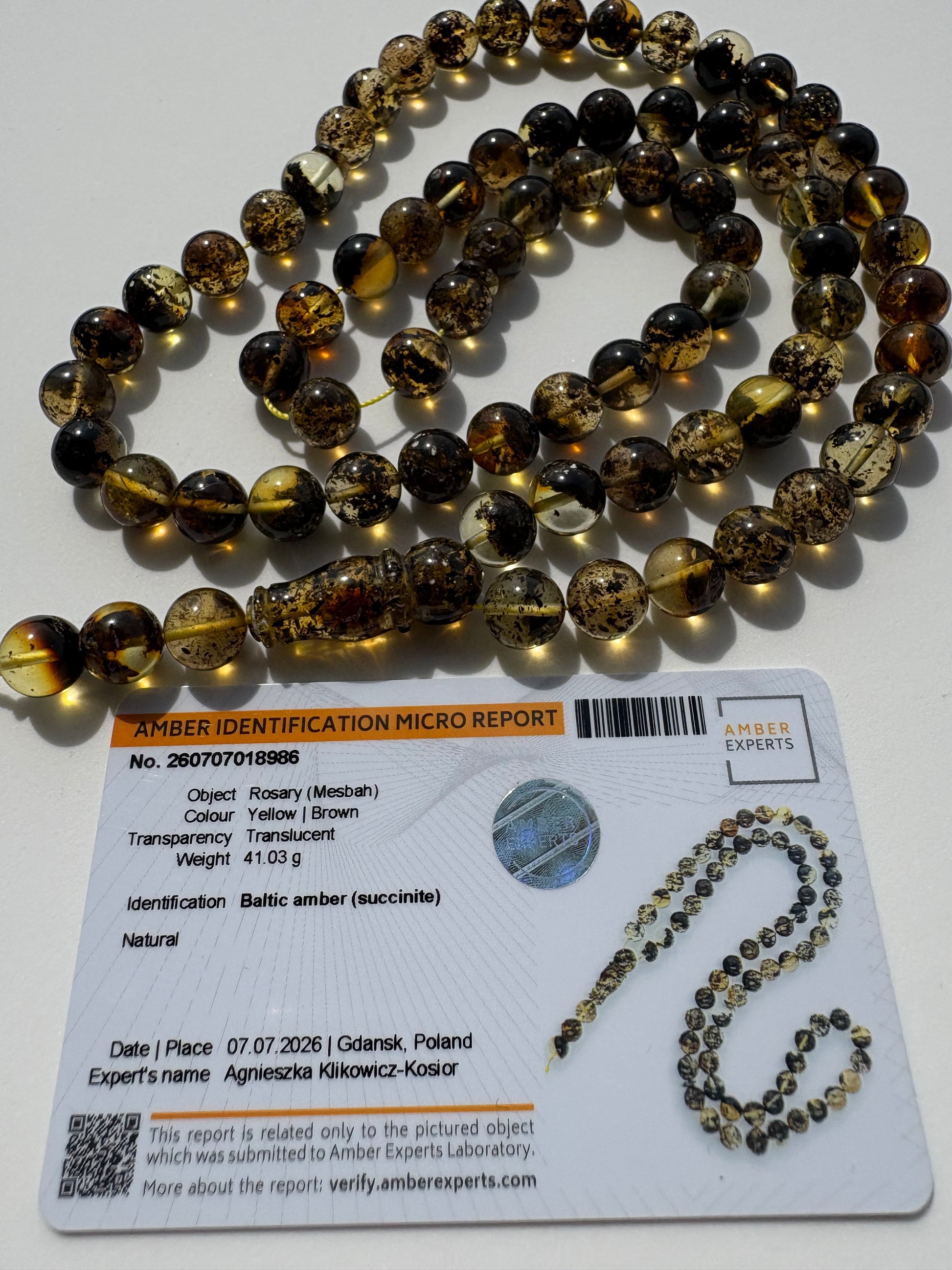 Certified Baltic amber Misbaha in cognac, honey and brown translucent amber.