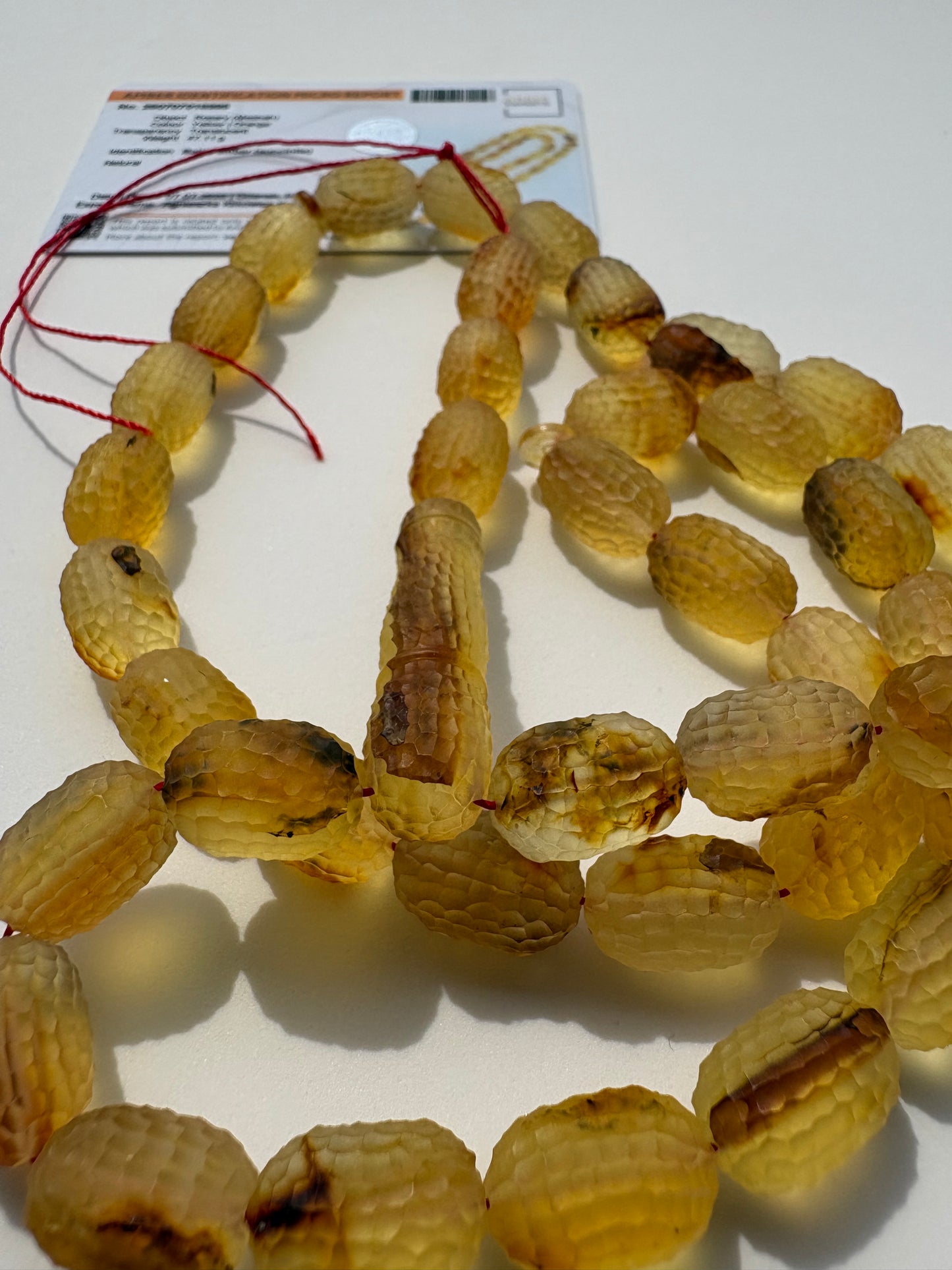 Luxury Baltic amber prayer beads in golden honey color.