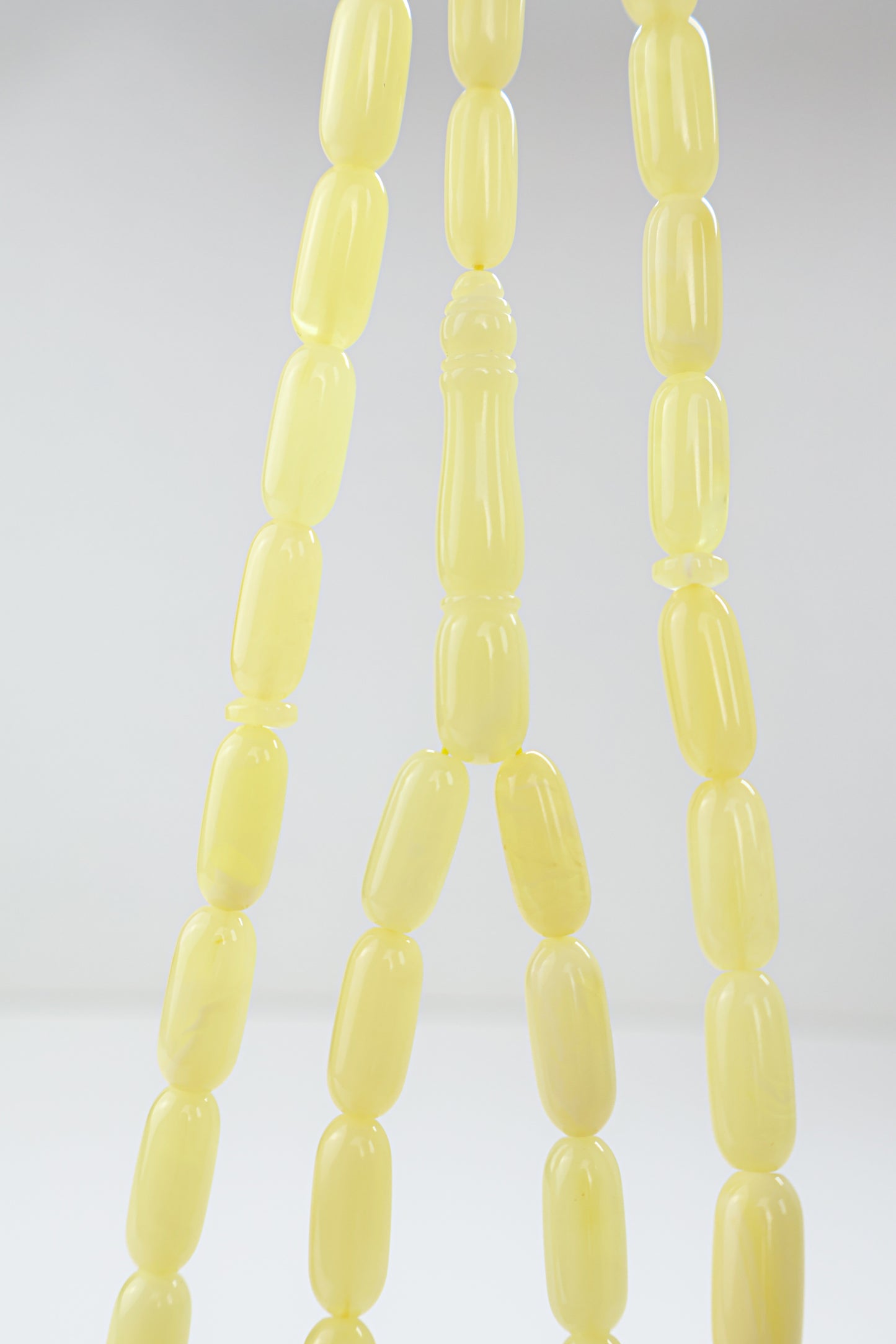 Genuine Baltic amber Mesbah featuring natural opaque creamy yellow amber beads.