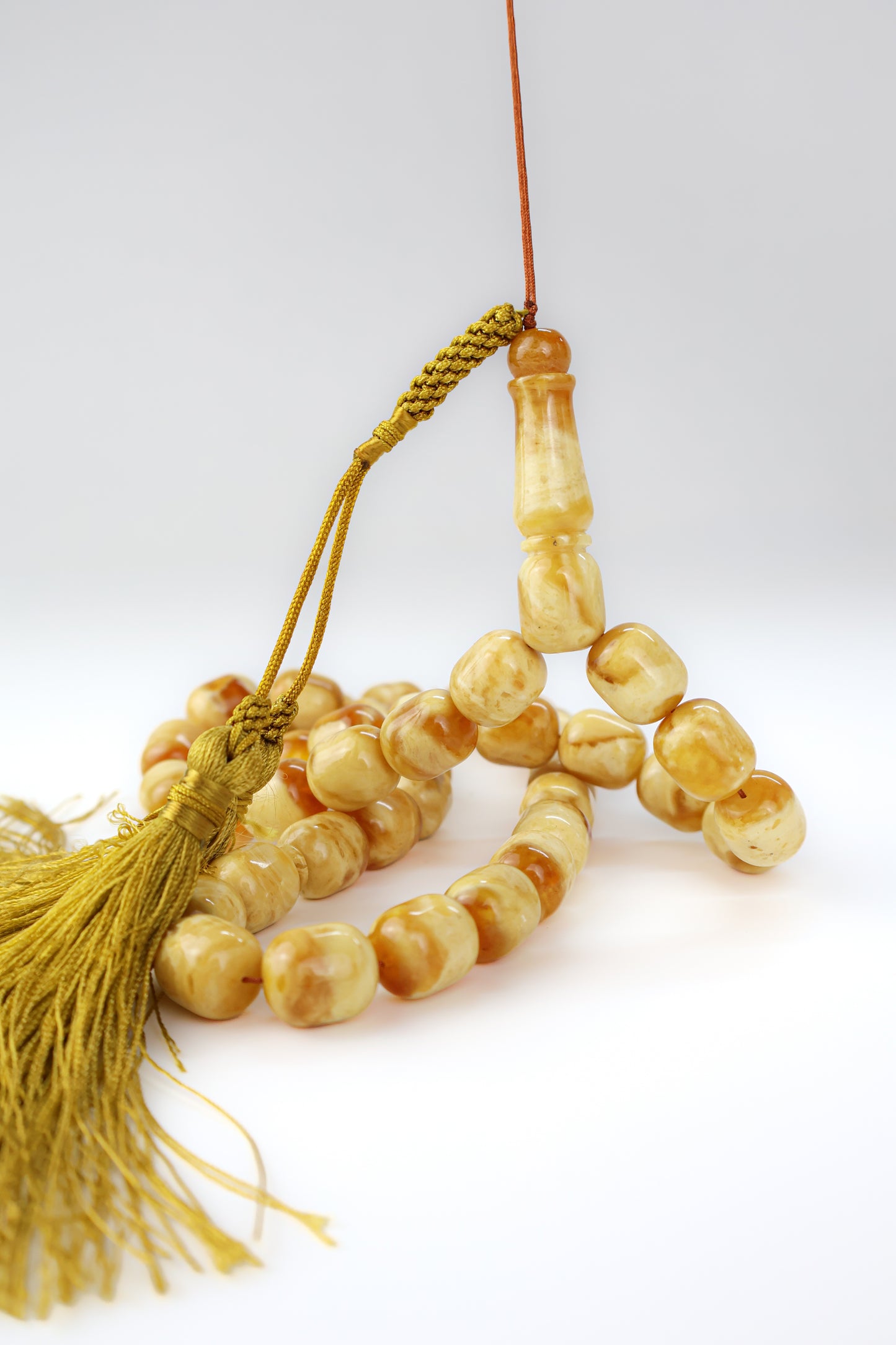 Pressed Baltic amber prayer beads 42 beads 13.7x11.8mm 60.38g with handmade Doha Qatar tassel and lab certificate from Tetibel Amber Jewels