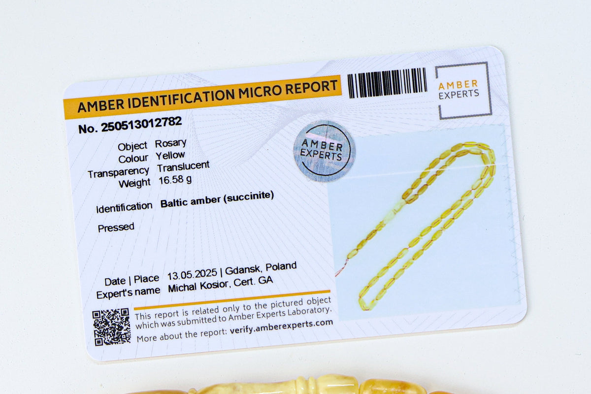  An amber identification report card on a clean white background.