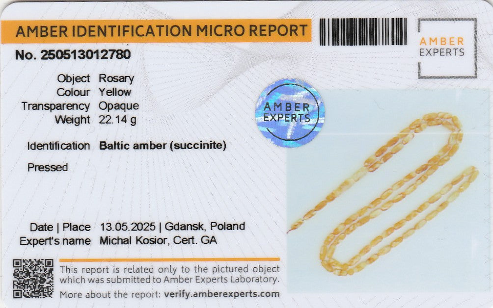 Amber Identification Micro Report with a Rosary on a blue background