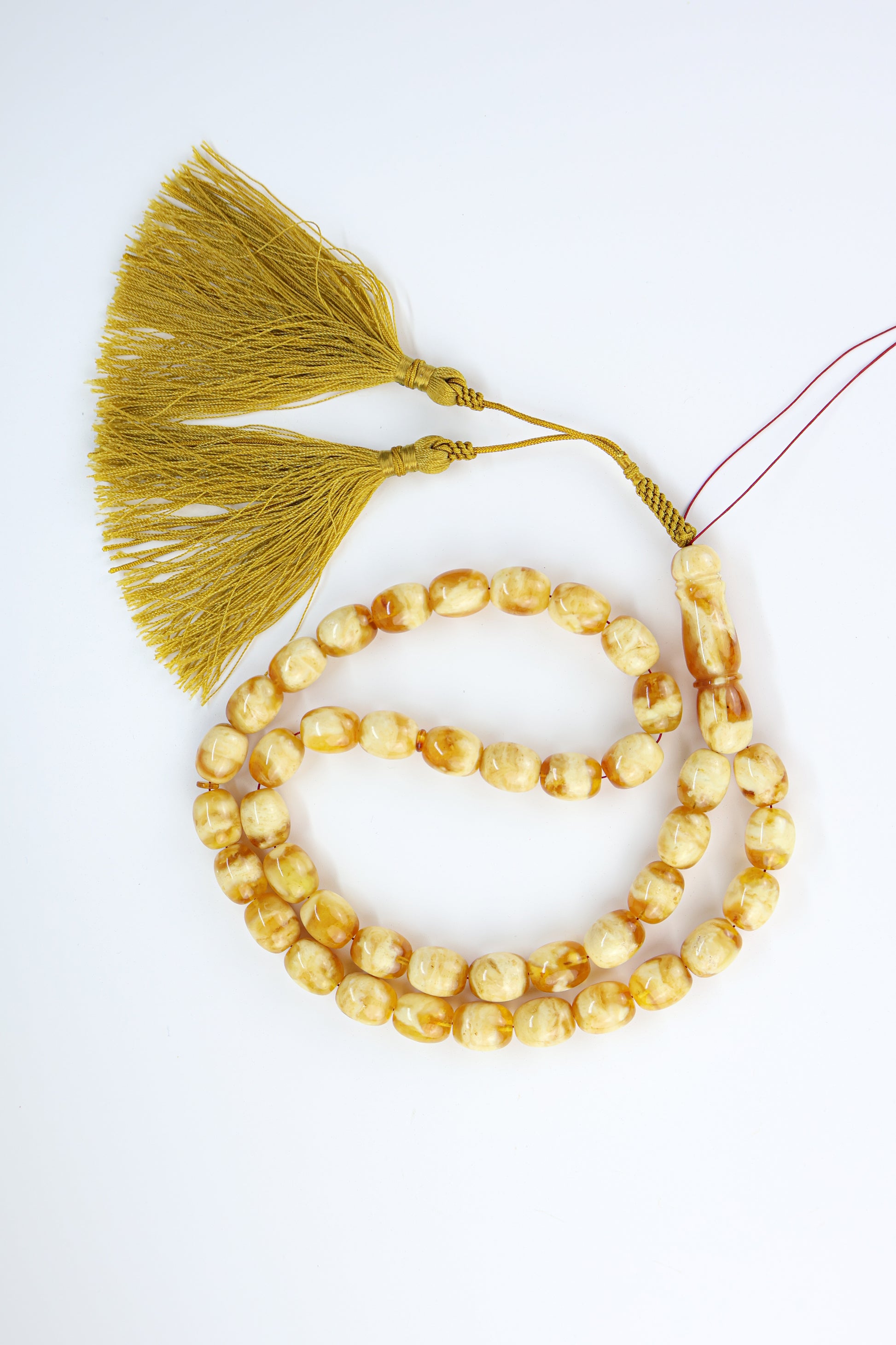Pressed Baltic amber prayer beads 42 beads 14.5x12mm 64.53g with handmade golden yellow Doha Qatar tassel and lab certificate from Tetibel Amber Jewels
