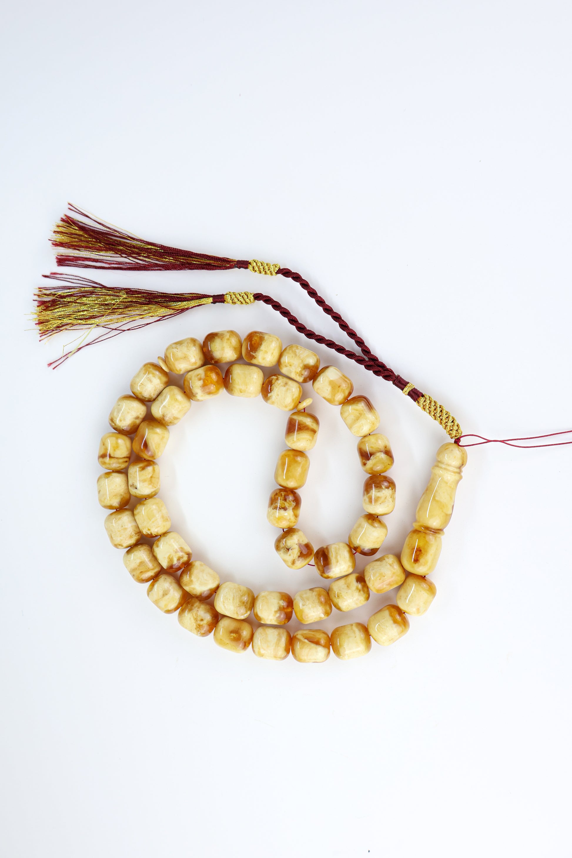 Pressed Baltic amber prayer beads 42 beads 15x12mm 72.25g with handmade burgundy and gold Doha Qatar tassel and lab certificate from Tetibel Amber Jewels