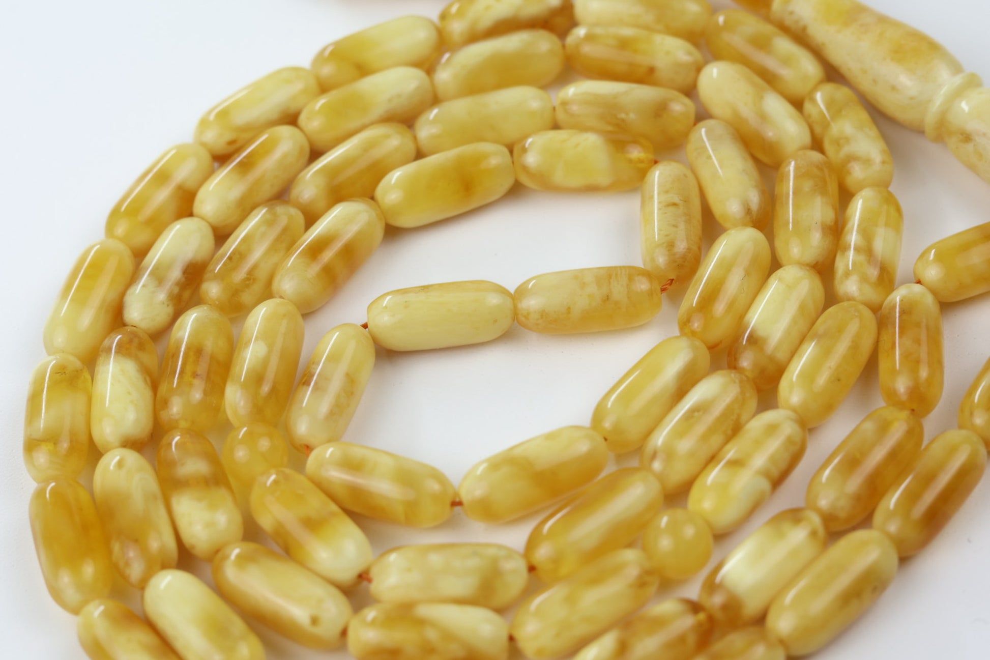  Tetibel pressed amber oval beads in butterscotch yellow tone, glossy Islamic rosary beads for Europe.