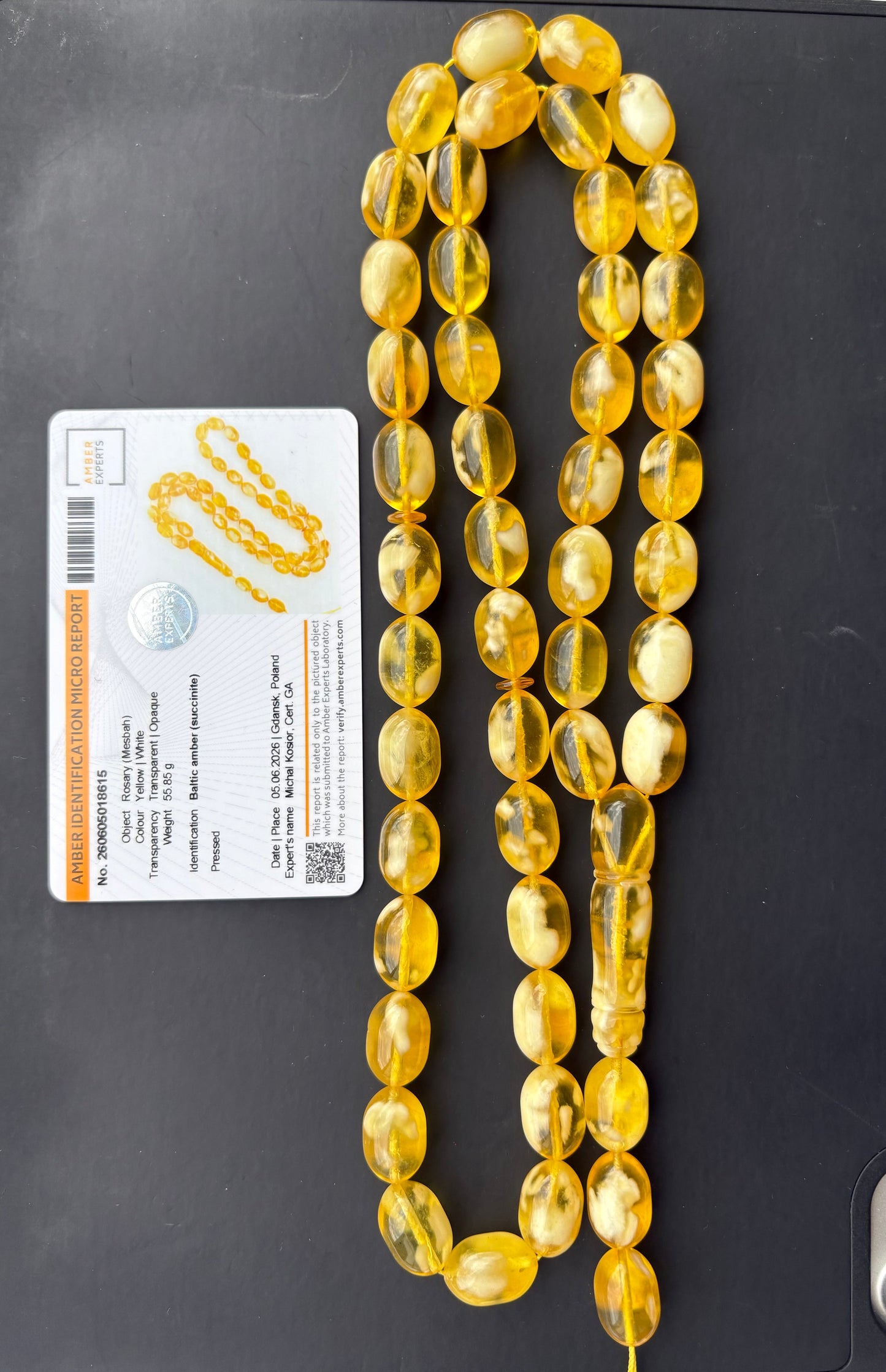 Tetibel Baltic Amber Mesbah rosary with 48 certified pressed yellow and white beads, weighing 55.85g, verified by Amber Experts laboratory in Gdańsk, Poland.